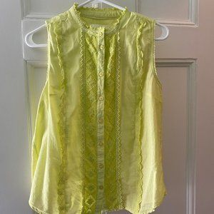 Lime green sleeveless blouse from Anthropologie